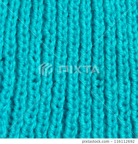 Handmade knitted fabric blue wool background texture Handmade knitted fabric blue wool background texture 116112692