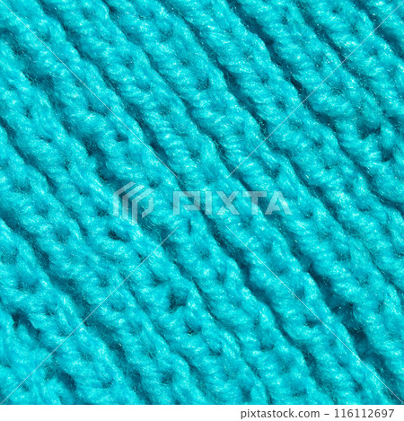 Handmade knitted fabric blue wool background texture Handmade knitted fabric blue wool background texture 116112697