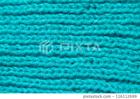 Handmade knitted fabric blue wool background texture 116112699