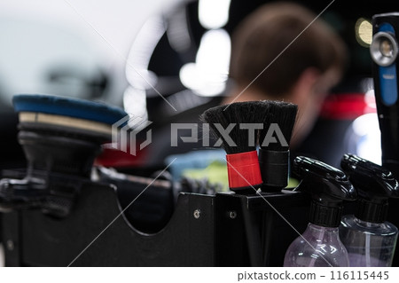 Tools and accessories used in car detailing electric polisher, brushes for cleaning  116115445