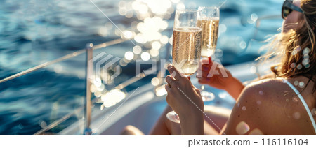 girls with champagne glasses on yacht. 116116104
