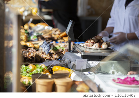 Lots of street food on the counter. Lots of street food on the counter. 116116402