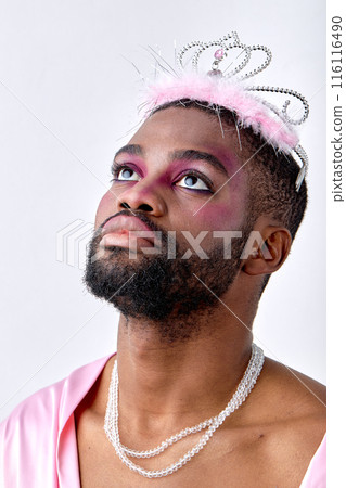 Dreamy male princess of black american appearance posing, half-naked man look up Dreamy male princess of black american appearance posing, half-naked man look up 116116490