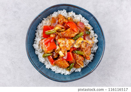 rice with Sweet and Sour fried pork chunks with vegetables, top view rice with Sweet and Sour fried pork chunks with vegetables, top view 116116517