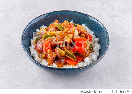 rice with Sweet and Sour fried pork chunks with vegetables, top view 116116519