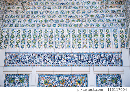 Uzbek ceramic tile decor with oriental Arabic patterns and ornaments on portal of Minor Mosque in Tashkent in Uzbekistan Uzbek ceramic tile decor with oriental Arabic patterns and ornaments on portal of Minor Mosque in Tashkent in Uzbekistan 116117004