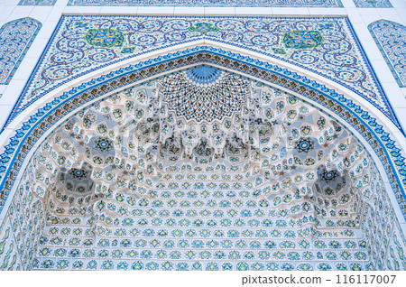 traditional Uzbek ceramic tile decor with oriental Arabic patterns and ornaments on portal of Minor Mosque in Tashkent in Uzbekistan 116117007