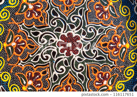pattern on oriental Uzbek ceramic plates hand-painted in Asian style close up pattern on oriental Uzbek ceramic plates hand-painted in Asian style close up 116117651