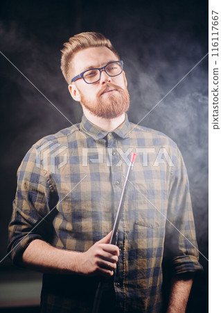 confident cool man in fashion shirt with hookah 116117667
