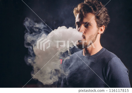 caucasian awesom man is blowing smoke caucasian awesom man is blowing smoke 116117815