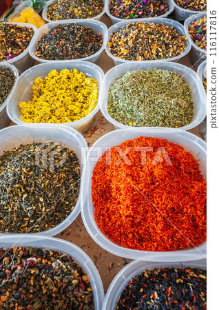 assortment of oriental herbal and flower teas on counter at the Asian spice market assortment of oriental herbal and flower teas on counter at the Asian spice market 116117816
