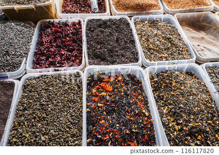 assortment of various oriental herbal and floral teas on the Asian spice market on counter in Uzbekistan 116117820