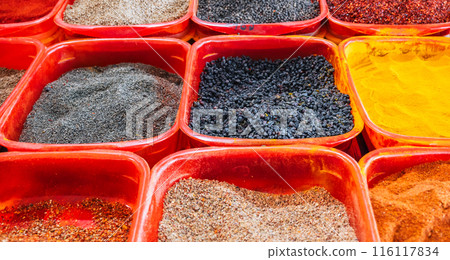 assortment of various oriental turkish spices on counter at the arabic bazaar in Turkey assortment of various oriental turkish spices on counter at the arabic bazaar in Turkey 116117834