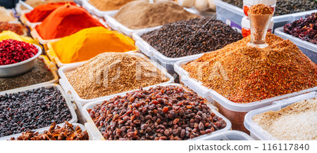 assortment of various oriental spices on the counter at Asian Uzbek market 116117840
