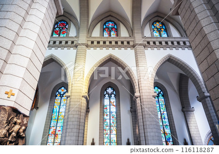 Sacred Heart of Jesus Cathedral in Tashkent in Uzbekistan. Interior of ancient Christian Catholic church with stained glass windows Sacred Heart of Jesus Cathedral in Tashkent in Uzbekistan. Interior of ancient Christian Catholic church with stained glass windows 116118287
