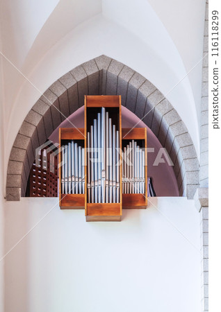 pipes of a organ inside interior of a Christian Catholic church. Cathedral of the Sacred Heart of Jesus in Tashkent pipes of a organ inside interior of a Christian Catholic church. Cathedral of the Sacred Heart of Jesus in Tashkent 116118299