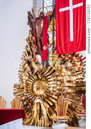 altar with Jesus Christ and cross inside interior of Christian Catholic church. Cathedral of the Sacred Heart of Jesus in Tashkent in Uzbekistan 116118352
