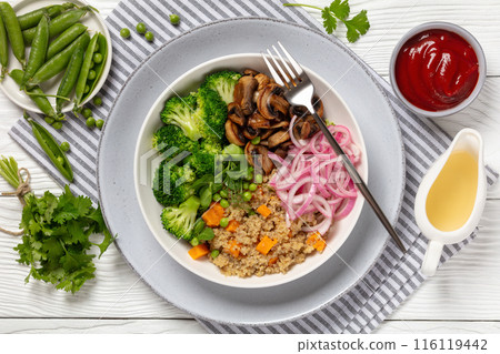 quinoa with veggies and mushrooms in a bowl quinoa with veggies and mushrooms in a bowl 116119442