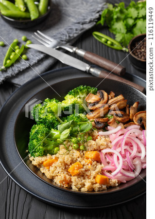 quinoa with veggies and mushrooms in a bowl quinoa with veggies and mushrooms in a bowl 116119449