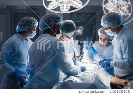 Surgeons perform a complex operation to save a human life at hospital Surgeons perform a complex operation to save a human life at hospital 116120168