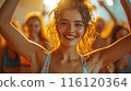 Smiling Woman Dancing at a Nightclub 116120364