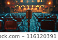 A Vintage Microphone on Stage Before a Live Audience 116120391