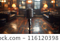 Vintage Microphone in a Dimly Lit Pub Setting 116120398