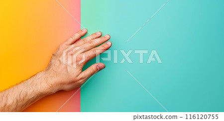 Hand reaching towards turquoise and yellow background Hand reaching towards turquoise and yellow background 116120755
