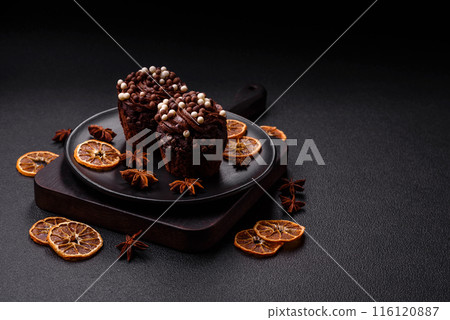 Delicious fresh muffins with filling and chocolate coating 116120887