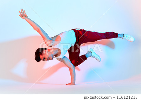 asian b-boy exercising in break dance on white background doing shoulder freeze 116121215