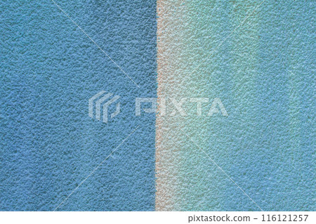Blue light plaster wall two colors abstract pattern design stucco background texture empty blank 116121257