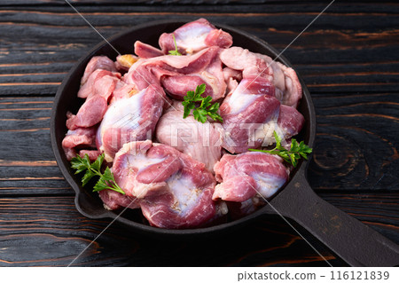 Raw chicken giblets gizzard ( stomach ) , meat background Raw chicken giblets gizzard ( stomach ) , meat background 116121839