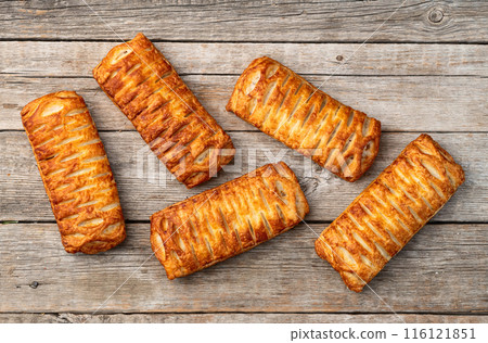 Golden Puff pastry stuffed with sausage and cheese 116121851