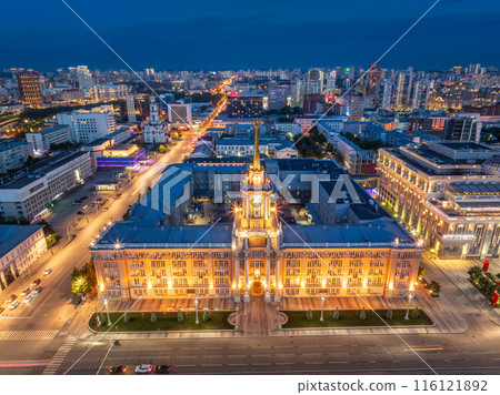 Yekaterinburg City Administration or City Hall and Central square at summer evening. Evening city in the summer sunset, Aerial View. Yekaterinburg City Administration or City Hall and Central square at summer evening. Evening city in the summer sunset, Aerial View. 116121892