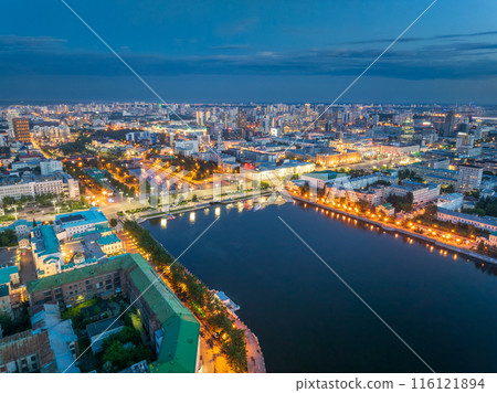 Embankment of the central pond and Plotinka in Yekaterinburg at summer or early autumn night. The historic center of the city of Yekaterinburg, Russia, Aerial View Embankment of the central pond and Plotinka in Yekaterinburg at summer or early autumn night. The historic center of the city of Yekaterinburg, Russia, Aerial View 116121894