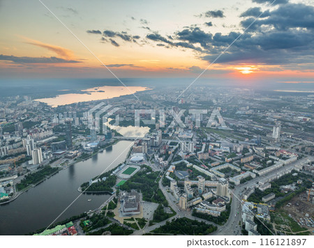 Yekaterinburg city with Buildings of Regional Government and Parliament, Dramatic Theatre, Iset Tower, Yeltsin Center, panoramic view at summer sunset. 116121897
