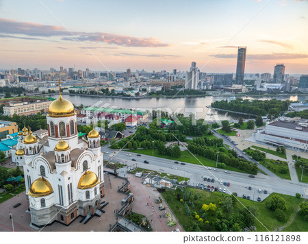 Summer Yekaterinburg and Temple on Blood in cloudy sunset. Aerial view of Yekaterinburg, Russia. Translation of the text on the temple 116121898