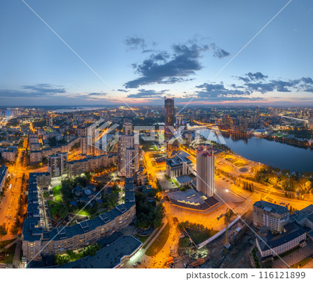 Yekaterinburg city and pond aerial panoramic view at summer or early autumn night. Night city in the early autumn or summer. 116121899