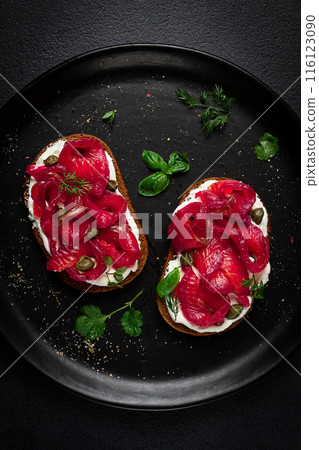 Sandwiches with gravlax salmon, cream cheese, capers, greens, breakfast, homemade, Sandwiches with gravlax salmon, cream cheese, capers, greens, breakfast, homemade, 116123090