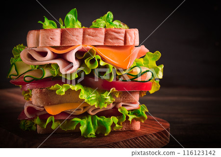 Club sandwich, on a wooden table, rustic style, close-up, no people, homemade, 116123142