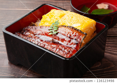 Grilled eel and egg on rice Grilled eel and egg on rice 116123498