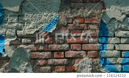 old brick wall with cracked paint old brick wall with cracked paint 116124232