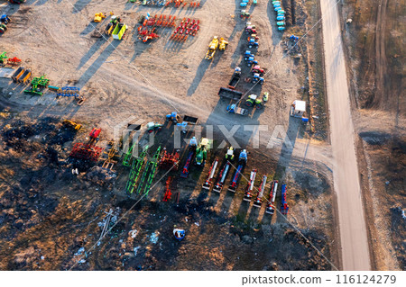 Aerial View of Construction Site With Trucks and Machinery Aerial View of Construction Site With Trucks and Machinery 116124279