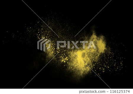 Golden powder explosion on black background. Freeze motion. Golden powder explosion on black background. Freeze motion. 116125374
