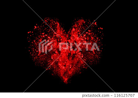 abstract red powder explosion on black background.abstract red powder splatted on black background. Freeze motion of red powder exploding. 116125707