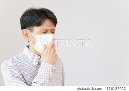 A man who is unwell, a man who coughs, coughs, coughs A man who is unwell, a man who coughs, coughs, coughs 116127922