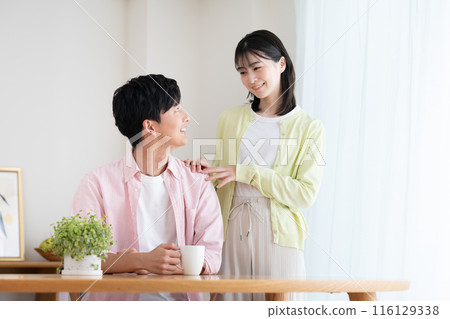 Young couple in a new house Young couple in a new house 116129338