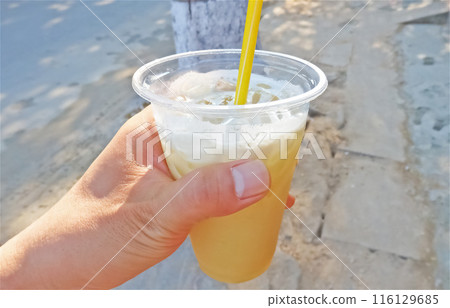 Sugarcane juice (Nuoc Mia) purchased from a mobile food stall in Hoi An, Vietnam 116129685