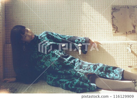 Portrait of a woman in the bathroom 116129909