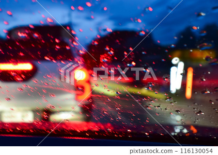 light of car on road with accident in the night, blurred background in rainy day 116130054